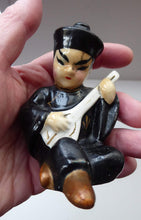 Load image into Gallery viewer, 1950s Vintage Cruet Set. Sweet Little Ceramic Chinese Man and Girl Salt and Pepper Pots
