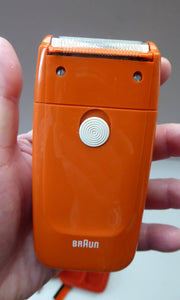 Orange Braun Electric Shaver, 1970s. Complete with original brush & in its own orange velvet lined carrying case
