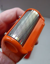 Load image into Gallery viewer, Orange Braun Electric Shaver, 1970s. Complete with original brush &amp; in its own orange velvet lined carrying case
