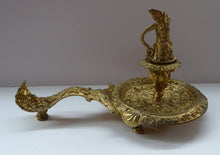 Load image into Gallery viewer, Antique Victorian ORMOLU / BRASS Chamberstick. Extremely Ornate Decoration with Devil Snuffer and Mask Heads. Very Rare

