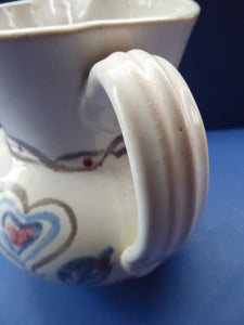 SCOTTISH POTTERY. Large Stoneware Jug, 7 inches in height. Made by Buchan, Portobello. Unusual Pattern with Heart Shapes