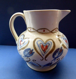 SCOTTISH POTTERY. Large Stoneware Jug, 7 inches in height. Made by Buchan, Portobello. Unusual Pattern with Heart Shapes