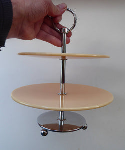 1950s Perspex CAKE STAND Peach Coloured. Art Deco Style with Lucite Plates & Fine Quality Chrome Base, Stand and Carrying Handle. Two Tiers