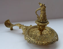 Load image into Gallery viewer, Antique Victorian ORMOLU / BRASS Chamberstick. Extremely Ornate Decoration with Devil Snuffer and Mask Heads. Very Rare
