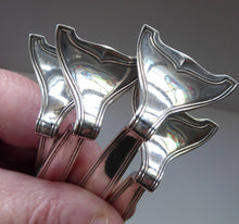 Load image into Gallery viewer, GERMAN Art Nouveau KNIFE RESTS. Set of Four. Each rest is silver plated and in excellent condition
