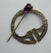 Load image into Gallery viewer, SCOTTISH SILVER. 1950s Penannular Brooch with Inset Amethyst. Traditional Design &amp; Edinburgh Hallmark 1957
