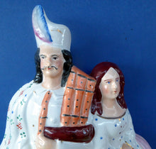 Load image into Gallery viewer, ANTIQUE Victorian Staffordshire Flatback Figurine. A Highlander and his Sweetheart Sitting on a Clock Face. Poor Man&#39;s Clock
