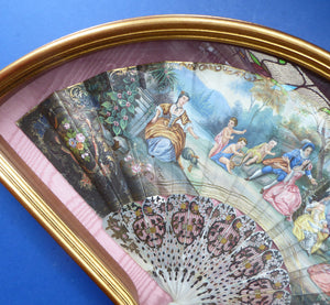 Antique FRAMED Hand Painted Fan with mother of pearl sticks and guards:  shaped, carved, pierced and gilt. FETE GALANTE design