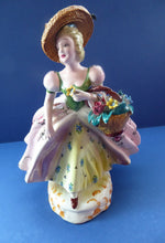 Load image into Gallery viewer, Vintage 1940s Italian Porcelain Figurine of a Lady Carrying a Basket of Flowers. Possibly Capodimonte
