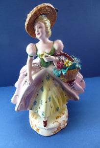 Vintage 1940s Italian Porcelain Figurine of a Lady Carrying a Basket of Flowers. Possibly Capodimonte