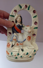 Load image into Gallery viewer, ANTIQUE Victorian 1880s Staffordshire Figurine. Pretty Little Shepherdess with Lamb Seated Under a Fruiting Bough
