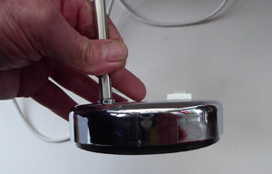 1960s CHROME DESK LAMP with movable shiny chrome shade, and on / off switch on the base. Good Condition