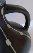 Load image into Gallery viewer, Unusual Black and White Pitcher or Jug. Matt Black Glaze with Incised Abstract Pattern. Signed SILA on the base
