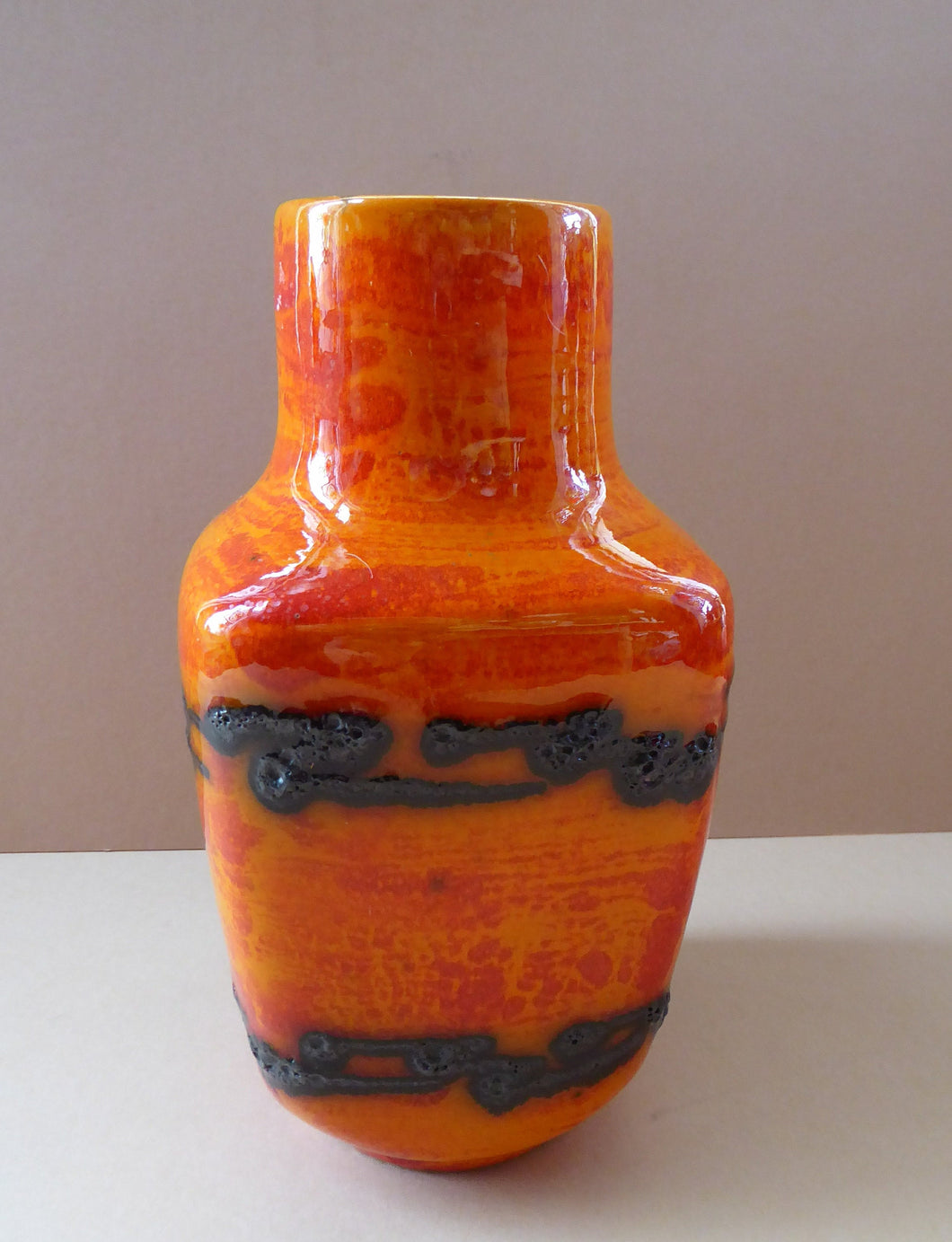 West German SCHEURICH Square Shaped Vase. Shiny Tangerine Orange Glazes: with Horizontal Lava Stripes 6 1/4 inches in heig