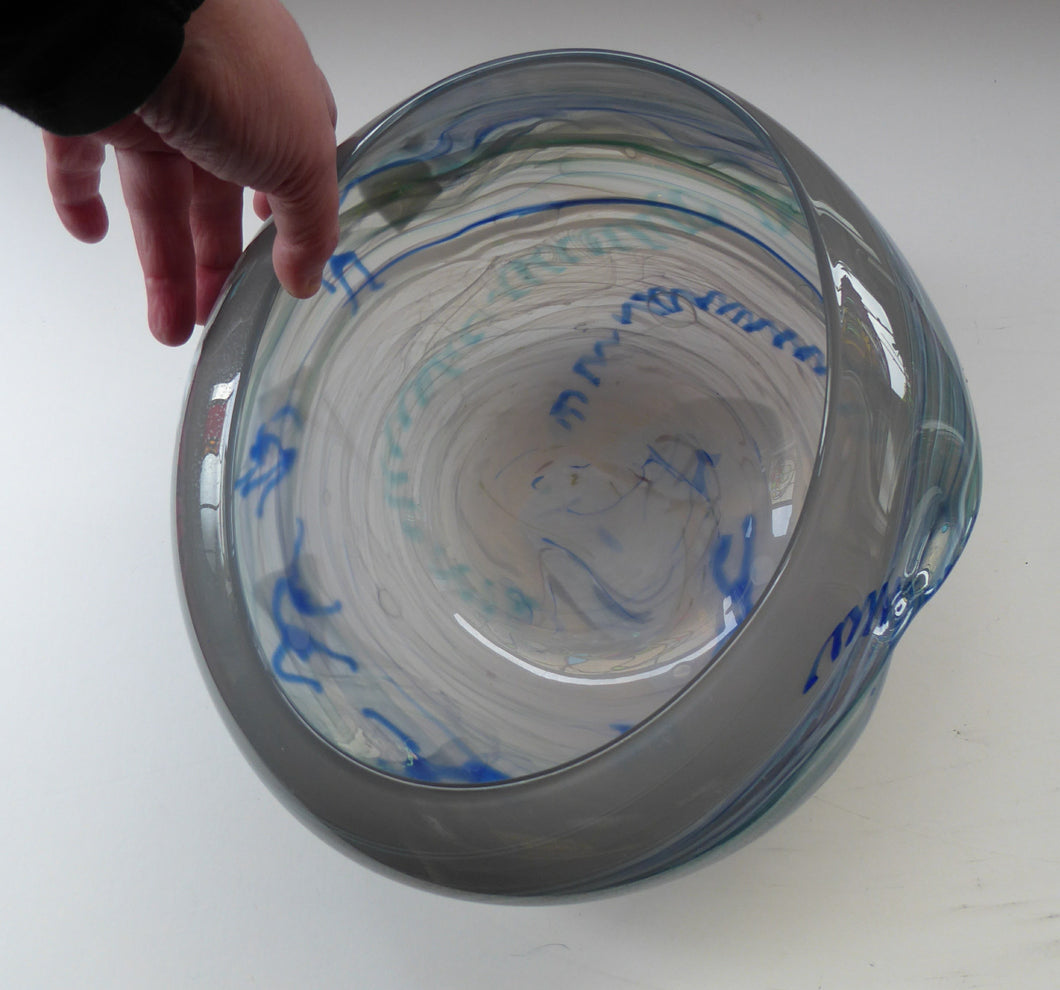 British STUDIO GLASS BOWL by the Scottish Glass Artist, Graham Muir. Signed. With images of little blue comical figures
