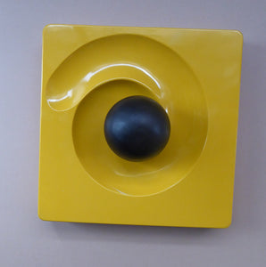ARTEMIDE MILANO. 1969 Classic Italian Design by Eleonore Peduzzi Riva;  Spiral / Spyros Ashtray. Yellow Plastic with Black Ball