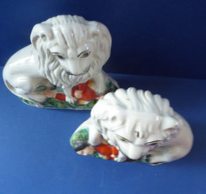 ANTIQUE Pair of Staffordshire Lions Showing the British Lion Trampling on a Recumbent Figure of the French Emperor, Napoleon III