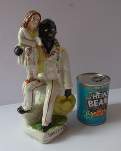 Victorian Staffordshire ANTIQUE Figurine of Uncle Tom and Little Eva  (c 1855). Literary Interest: Uncle Tom's Cabin