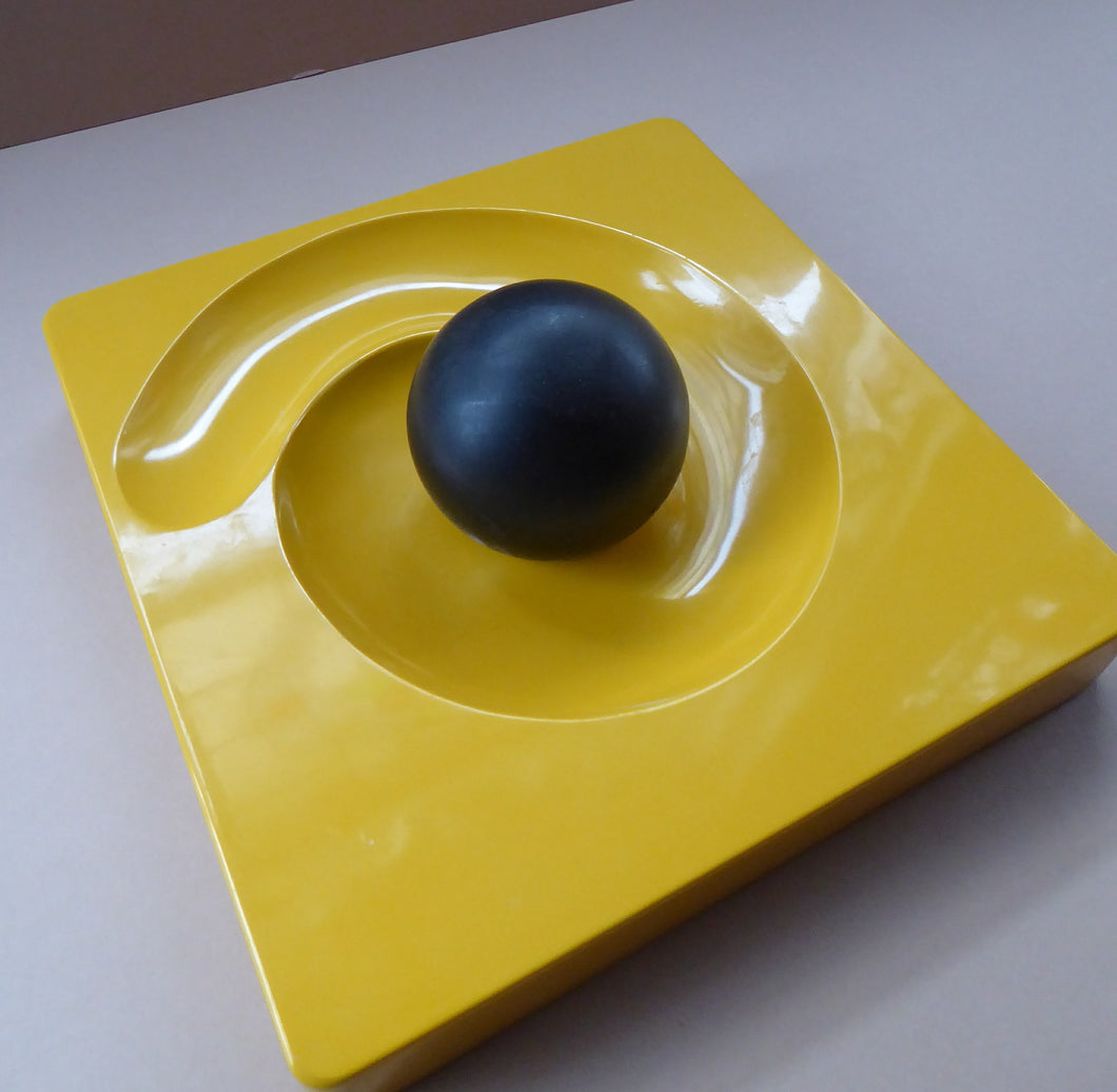 ARTEMIDE MILANO. 1969 Classic Italian Design by Eleonore Peduzzi Riva;  Spiral / Spyros Ashtray. Yellow Plastic with Black Ball