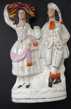 Load image into Gallery viewer, LARGE Antique STAFFORDSHIRE Figurine of a Country Couple Back from Harvest; Height 12 1/2 inches
