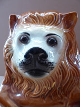 Load image into Gallery viewer, Large ANTIQUE Victorian Staffordshire Recumbent Lion with Glass Eyes. 11 inches in length
