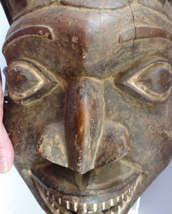 MASSIVE SIZE. Vintage Early / Mid 20th Century Cameroon Bamileke Wooden Helmet Mask with Carved Crocodile Headress