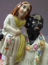 Load image into Gallery viewer, Victorian Staffordshire ANTIQUE Figurine of Uncle Tom and Little Eva  (c 1855). Literary Interest: Uncle Tom&#39;s Cabin
