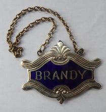 Load image into Gallery viewer, 1930s SILVER PLATE and Royal Blue Guilloche Enamel Brandy Decanter Label
