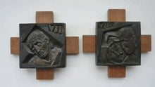 Load image into Gallery viewer, 14 Stylised Vintage Cast Bronze Plaques Mounted on Oak Batons: The Stations of the Cross by R. Gourdan
