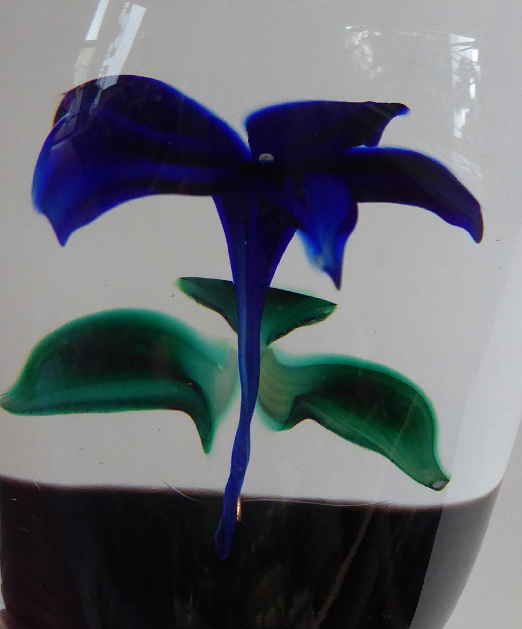 Sweet Vintage Strathearn Paperweight with delicate little upright dark blue flower. Paper label &  S75 millefiori signature cane