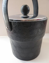 Load image into Gallery viewer, 1970s Ice Bucket. White Plastic Interior with Embossed Black Polka Dot Exterior

