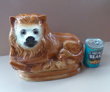 Load image into Gallery viewer, Large ANTIQUE Victorian Staffordshire Recumbent Lion with Glass Eyes. 11 inches in length
