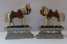 Load image into Gallery viewer, VICTORIAN PAIR of Cast Iron White Horses Door Stops or Fireplace Ornaments. With Original Paintwork &amp; Victorian Registration Lozenge
