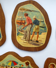 Load image into Gallery viewer, STRANGE 1950s Wooden Plate Mats - with Stylish Seaside or 1950s Beach Illustrations on each

