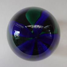 Load image into Gallery viewer, Sweet Vintage Strathearn Paperweight with delicate little upright dark blue flower. Paper label &amp;  S75 millefiori signature cane
