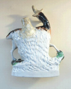 STAFFORDSHIRE POTTERY. Strange Victorian Spill Holder featuring a milkmaid and a massive goat