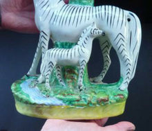 Load image into Gallery viewer, STAFFORDSHIRE ZEBRA and Foal Spill Vase; Very Rare Antique Model c 1860
