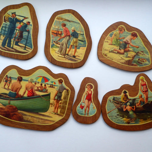 STRANGE 1950s Wooden Plate Mats - with Stylish Seaside or 1950s Beach Illustrations on each