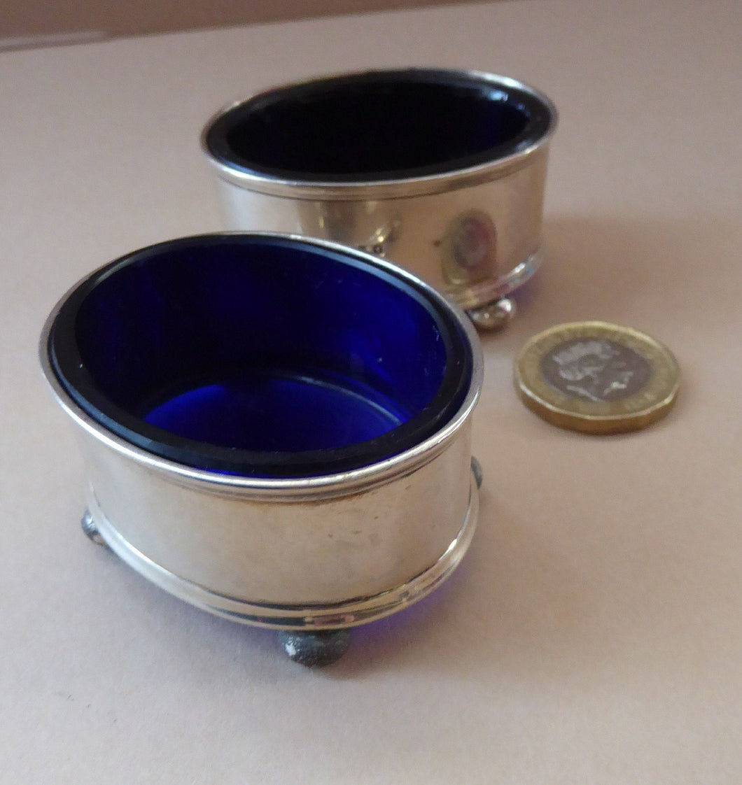 1921 SOLID SILVER Pair of Table Salts with Simple Design. Original Fitted Bristol Blue Glass Liners. Excellent Condition.
