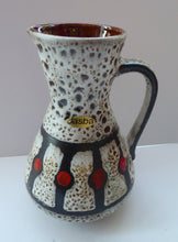 Load image into Gallery viewer, Vintage 1970s West German Pottery Handled Vase or Pitcher. JASBA WARE with Orange Polka Dot Pattern. 6 3/4 inches high
