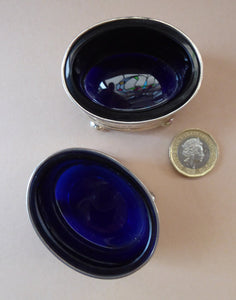 1921 SOLID SILVER Pair of Table Salts with Simple Design. Original Fitted Bristol Blue Glass Liners. Excellent Condition.