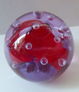 SCOTTISH GLASS. Vintage Caithness Paperweight Entitled DIABELO. 1993 Purple and Red Swirls with Controlled Air Bubbles