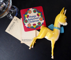 VINTAGE Babycham Job Lot: Large Plastic Babycham Bambi Fawn Model. 7 1/2 inches. Offered with four coupe glasses, Happy Christmas Beer Mat
