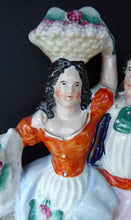 Load image into Gallery viewer, Where is this? ANTIQUE Victorian Staffordshire Flatback Figurine. Rarer Example of a Man and Woman at a Gate Collecting Grapes
