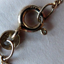 Load image into Gallery viewer, SCOTTISH SILVER. 1970s ORTAK Starburst Pendant Necklace. Designed by Malcolm Grey.  Set with Three Smoky Quartz Stones. Hallmarked
