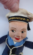 Load image into Gallery viewer, Genuine Vintage Norah Wellings SAILOR DOLL. Wearing SS. Argentina Star Cap. Original Label Sewn on Base of Foot
