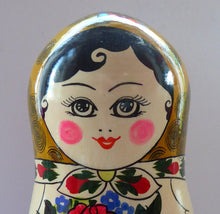 Load image into Gallery viewer, Vintage RUSSIAN Matryoshka Nesting Dolls.  Genuine Russian Set with Original Label Dated 1998. 9 DOLLS in total
