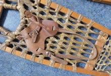 Load image into Gallery viewer, Vintage Snowshoes, Genuine Old Wooden Snowshoes, with Hide Mesh and Old Brown Leather Shoe Pockets. Great Ski Lodge Decorations
