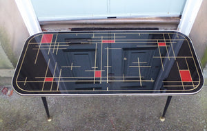 Fabulous 1950s Atomic Space Age Glass Topped Rectangular Coffee Table. Original Screw on Legs with Brass Feet