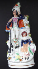 Load image into Gallery viewer, Antique STAFFORDSHIRE Figurine. Rarer Group of Huntsman, Dog &amp; Game, and Little Seated Girl. Excellent Condition. 11 1/4 inches high
